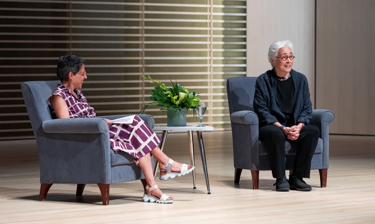 Carolyn Muzzy Director Jacqueline Terrassa in conversation with artist Katherine Bradford on a stage at the Summer Luncheon.