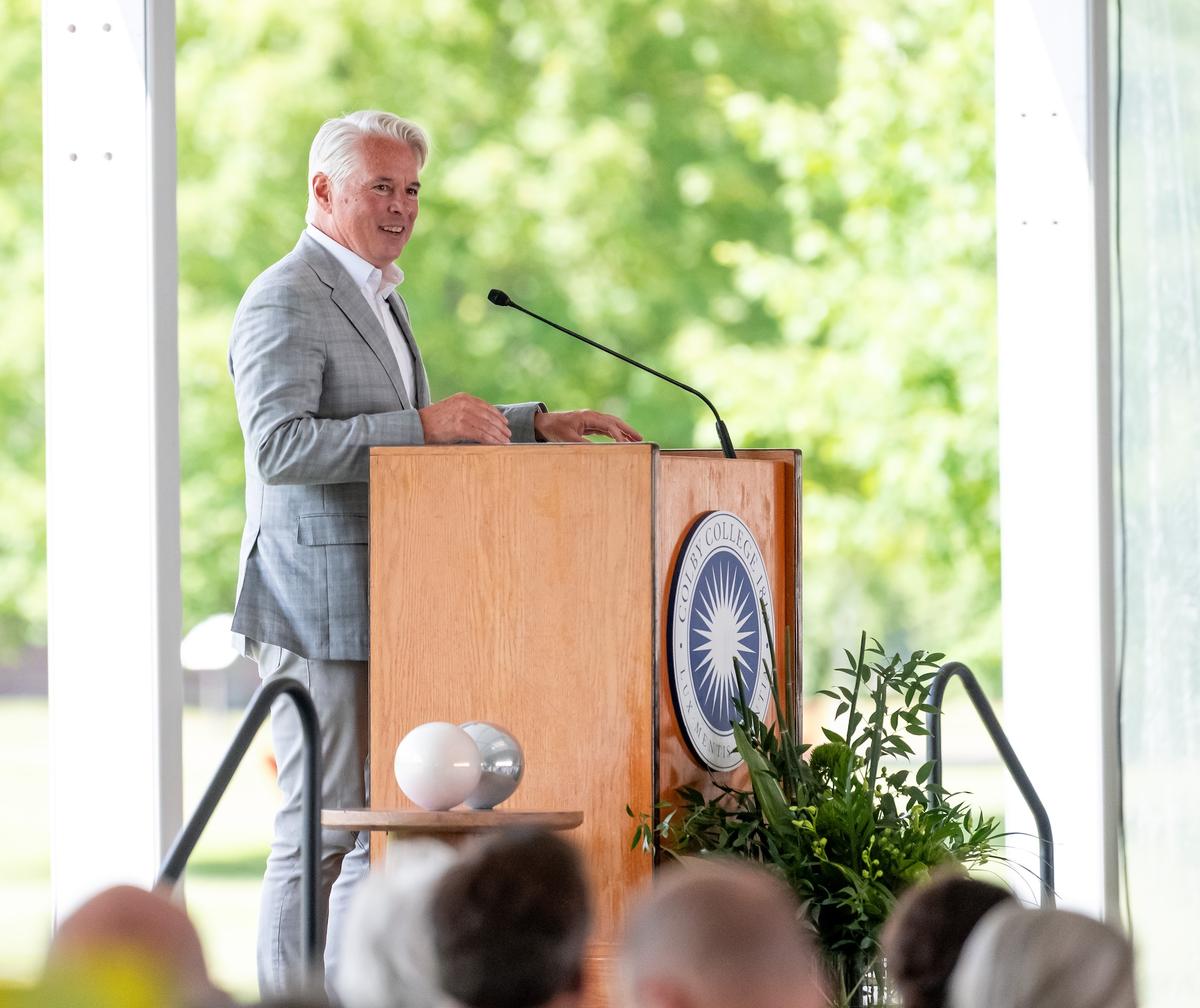 President David A. Greene speaking at the podium at the Summer Luncheon.