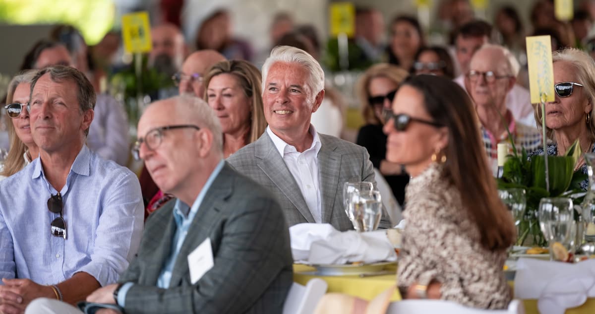 President David A. Greene and guests at their tables at the Summer Luncheon.