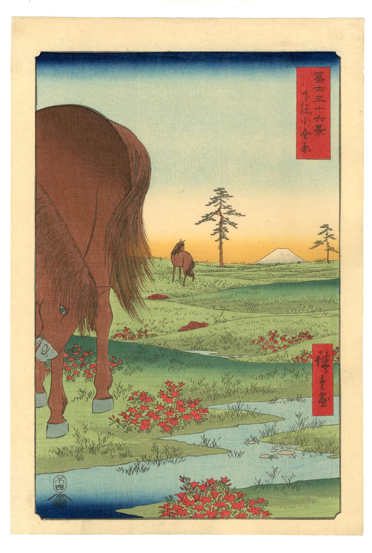 Japanese ukiyo-e woodblock print depicting a brown horse cropped closely on the left side, grazing near a small stream lined with red flowers. In the grassy distance, another horse stands near a lone pine tree, with Mount Fuji visible on the horizon beneath a yellow-to-blue gradient sky.