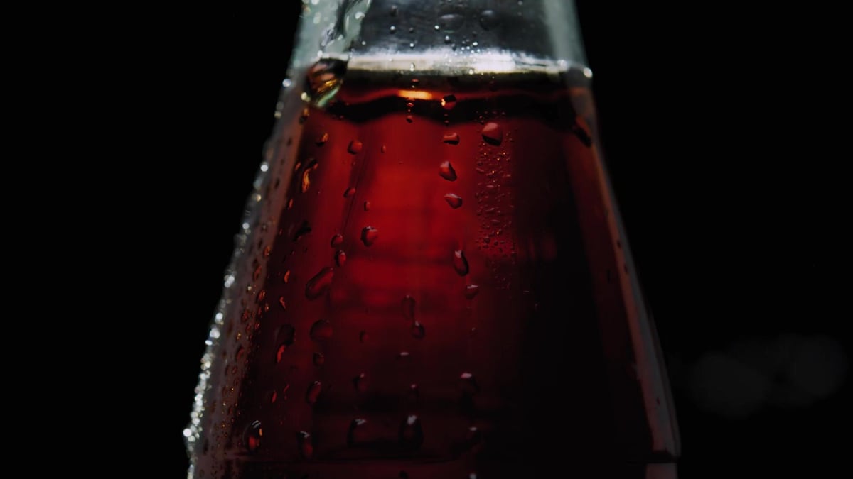COCA-COLA — Motion