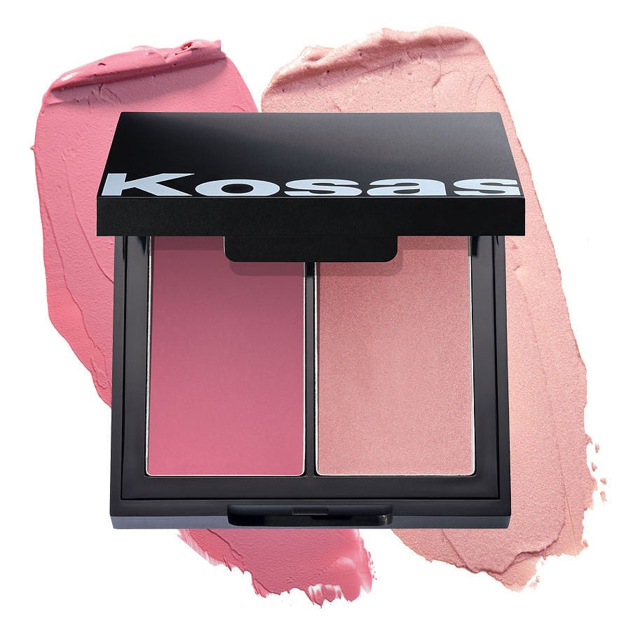 A Kosas blush duo compact open on a swatch of pink and rose cream on white