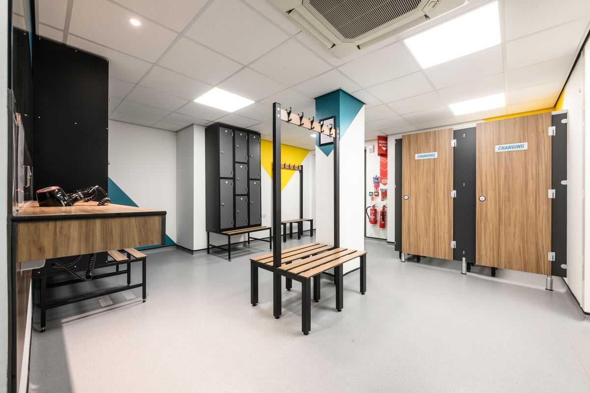 PureGym London Southgate changing room with benches and lockers