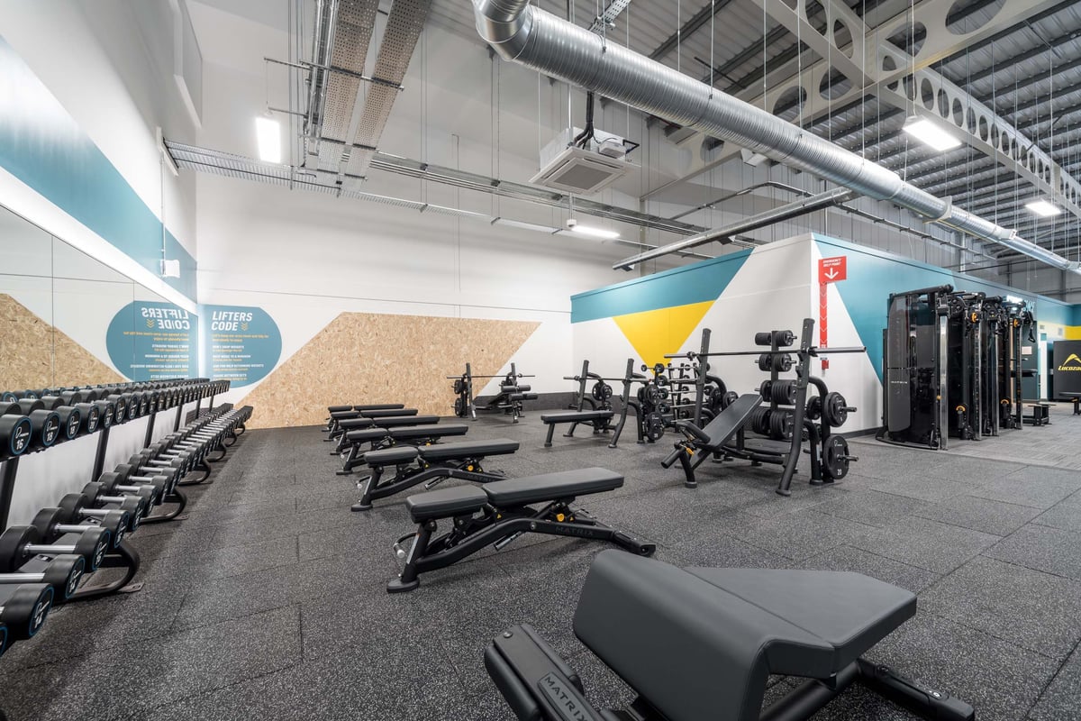 PureGym Blackwood free weights area with benches and dumbbells