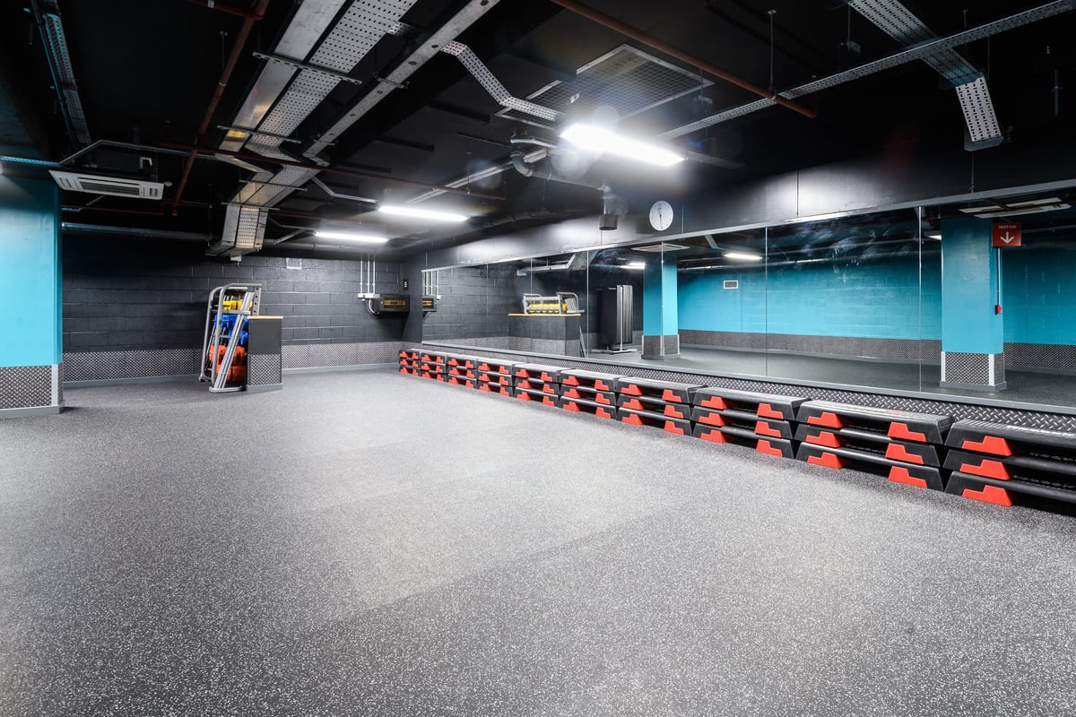 PureGym London East India Dock: Studio with large mirror and step equipment