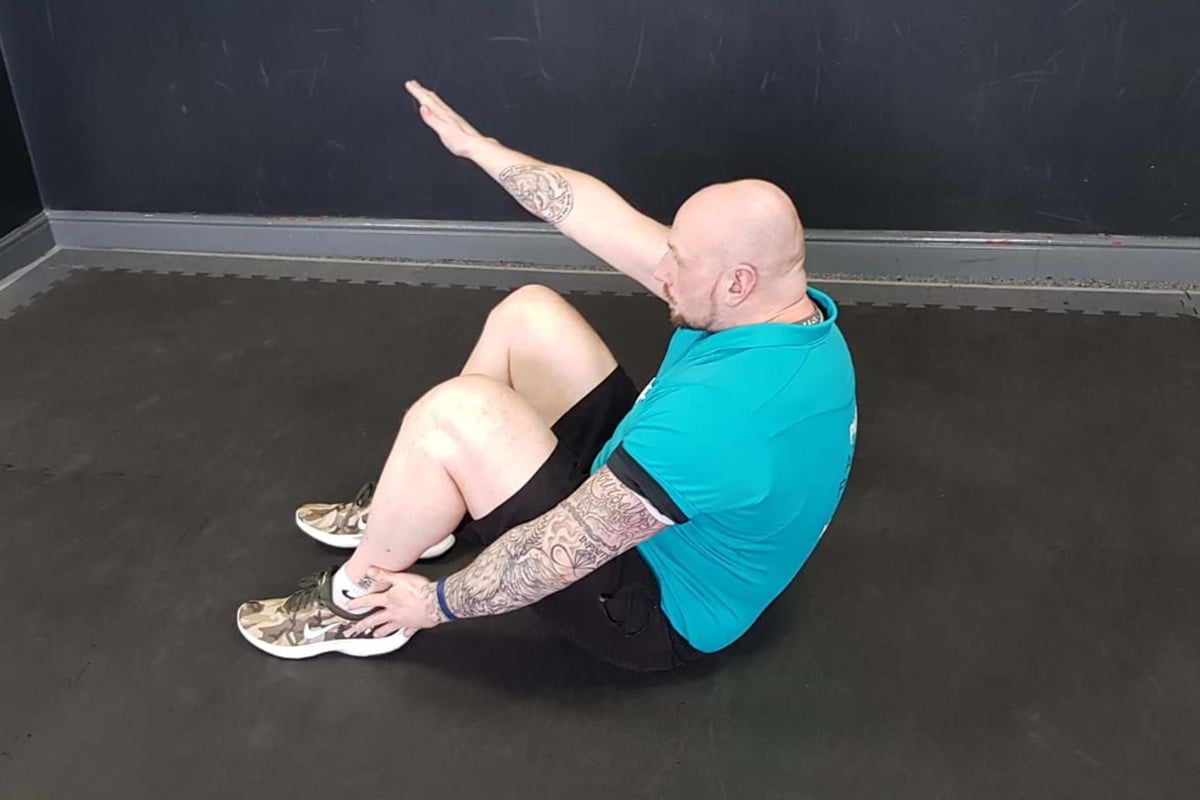 heel touches ab exercise end position
