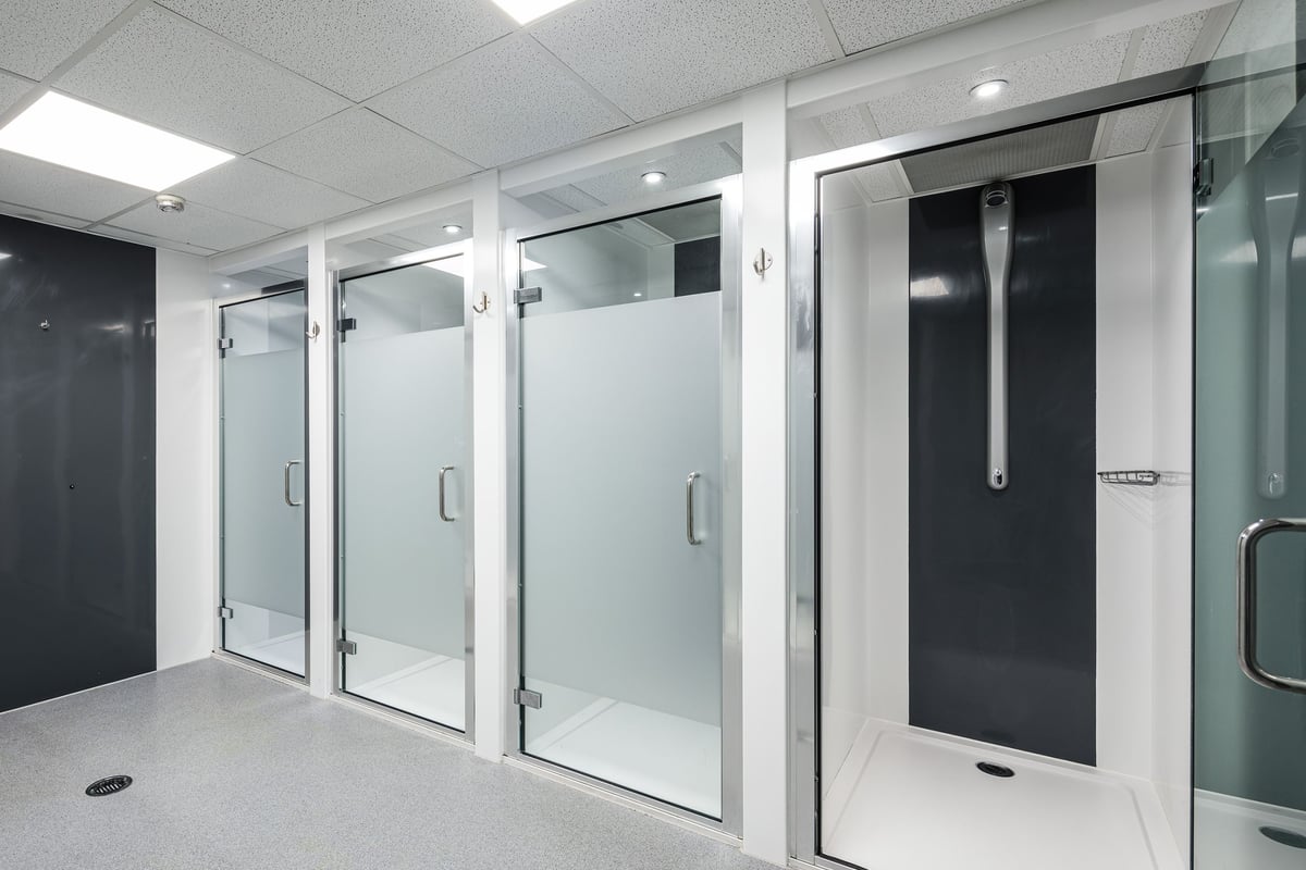 PureGym Dudley Tipton: Glass doors leading to changing rooms or shower facilities.