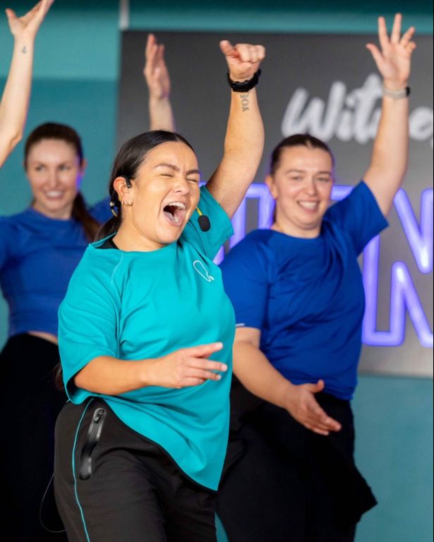 PureGym members and instructor doing a Zumba class