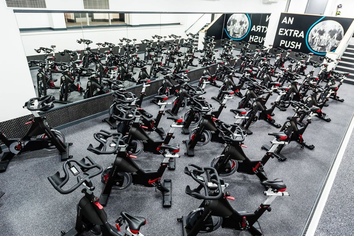 PureGym London Holborn: Rows of stationary exercise bikes crammed together in an indoor space.