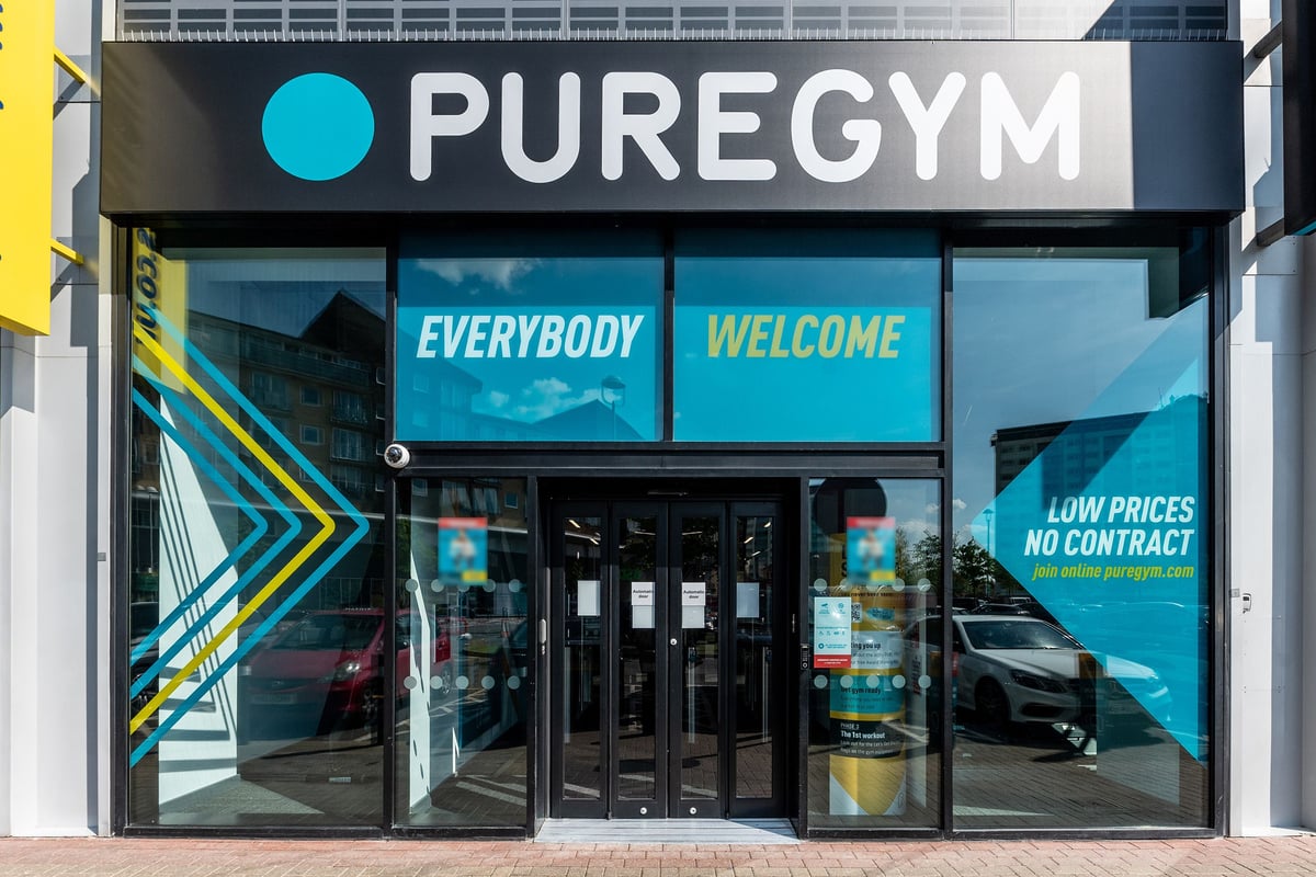 PureGym London Feltham: Gym frent entrance with 'Everybody Welcome' and "Low Prices No Contract" signage.