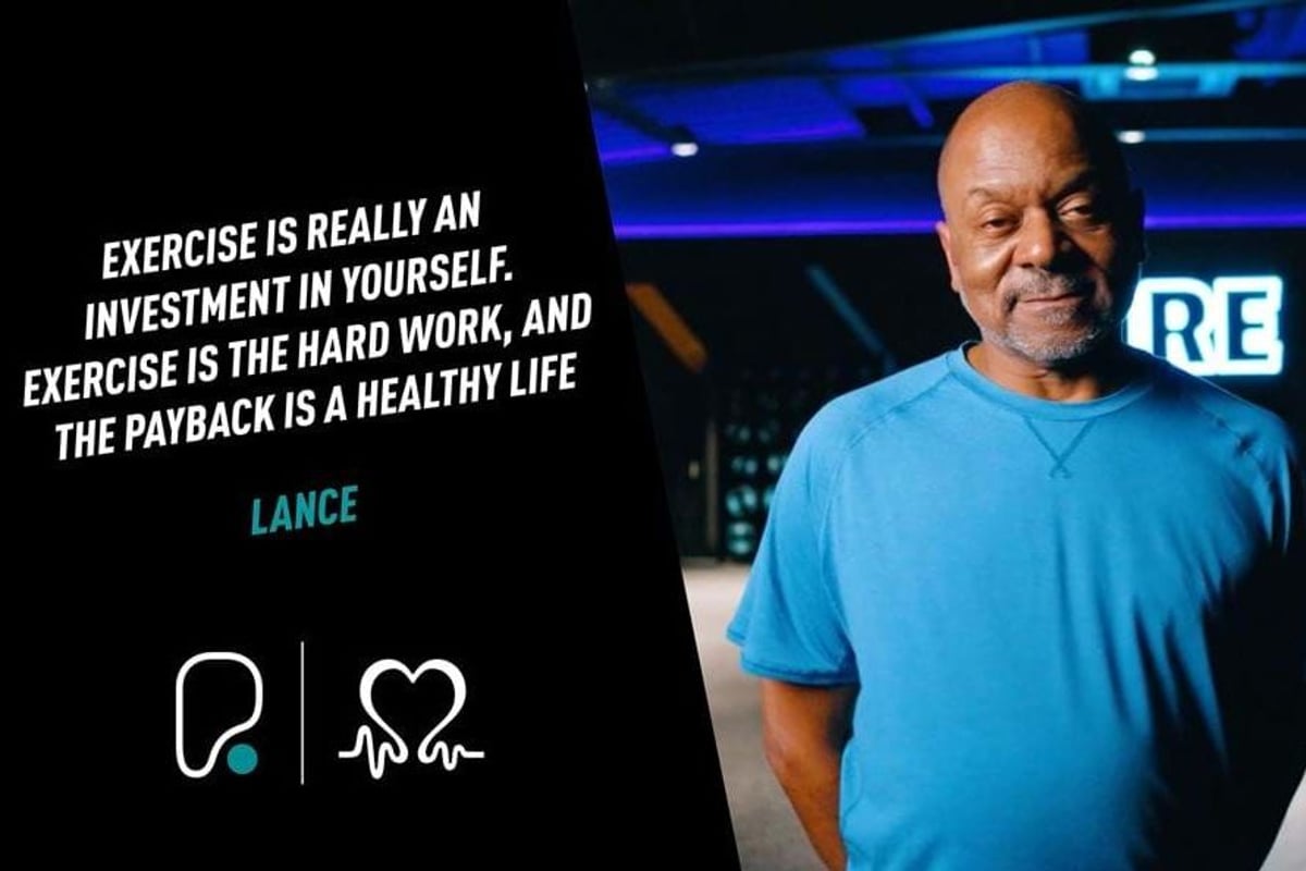 Man in blue t-shirt standing with a motivational exercise quote on a black background.