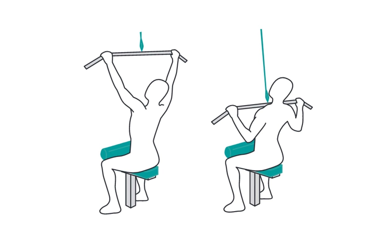 Person performing lat pulldown exercise on a machine with a wide grip bar.