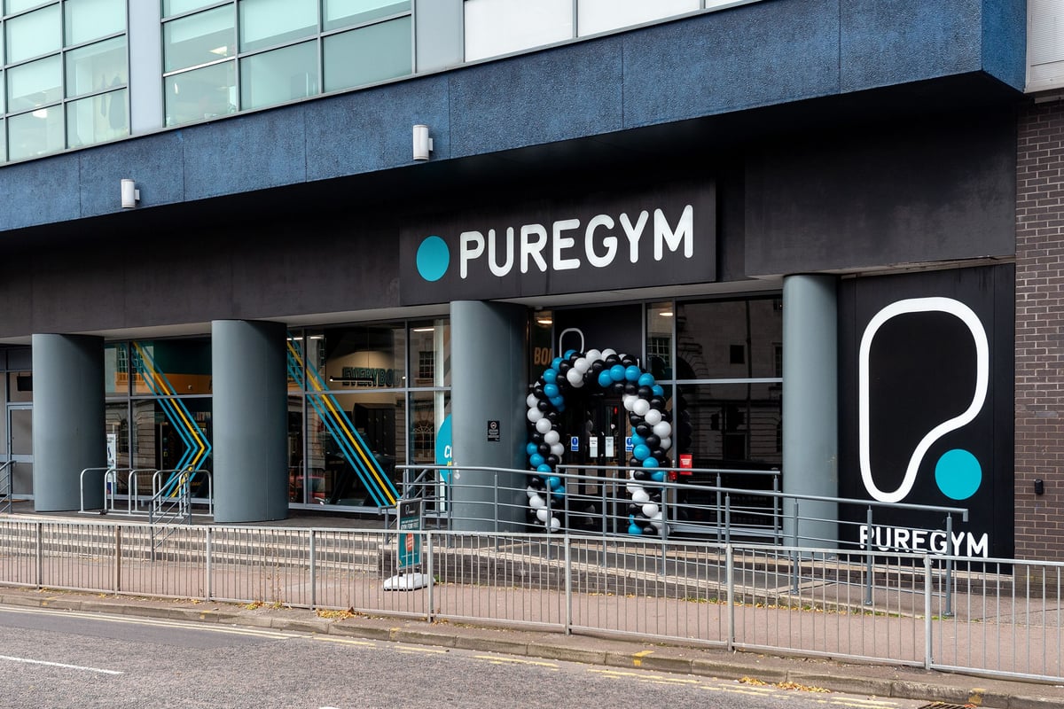 PureGym Leicester St Georges Way: Entrance with kettlebells sculpture, PureGym branding on facade.