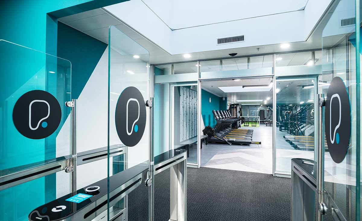 PureGym Fribourg studio entrance showing the secure access gates.