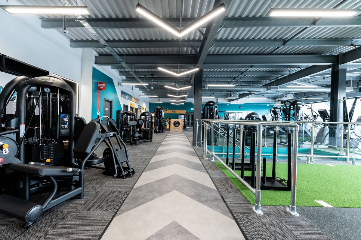 PureGym Yate: Treadmills, weight machines, functional training area with turf, free weights, and exercise balls.