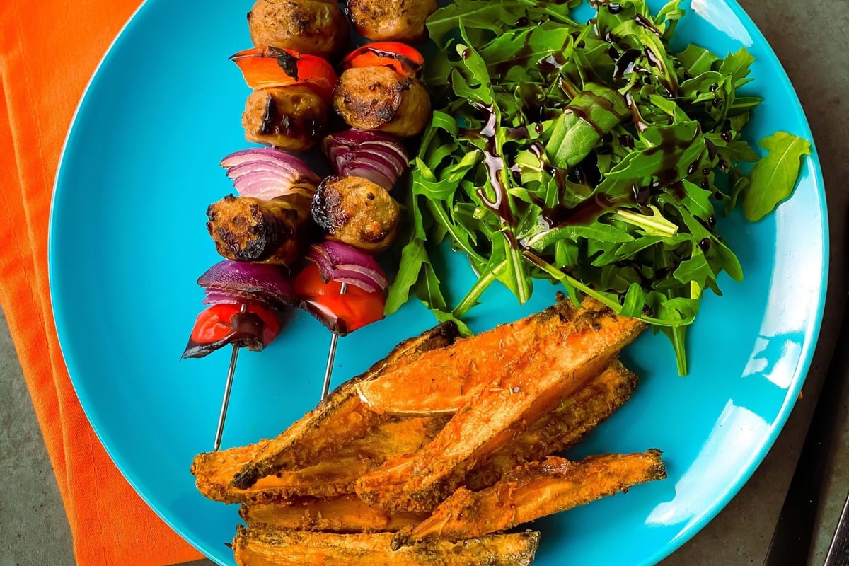 Grilled vegetable skewers, sweet potato fries, rocket salad with balsamic glaze