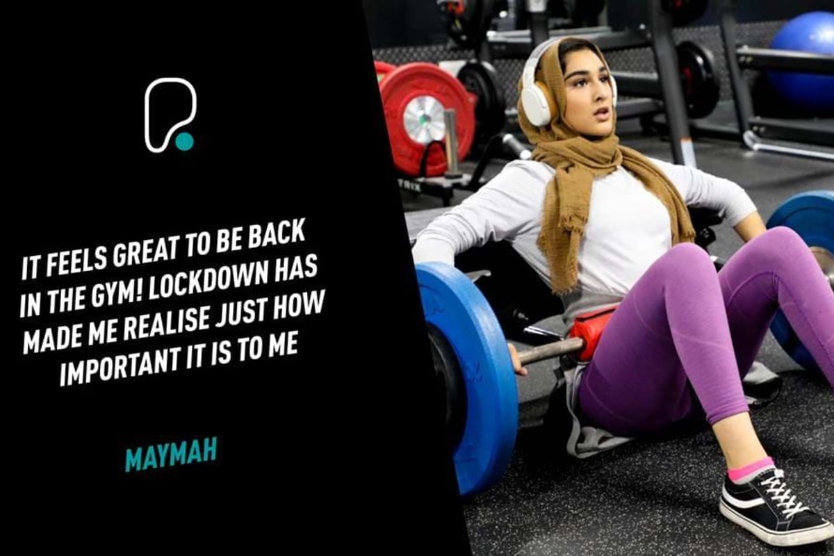 Woman in hijab lifting weights in gym with motivational text on left side