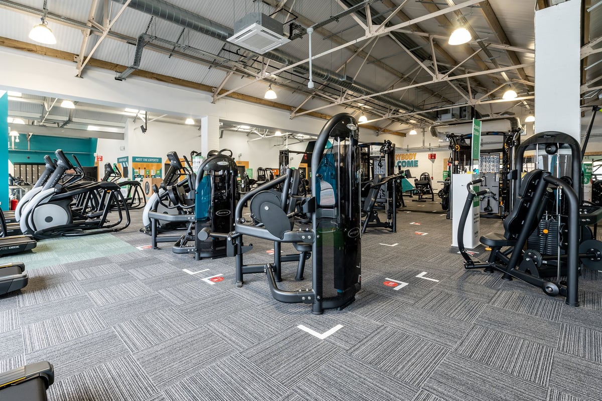 PureGym Puregym Crayford: Rows of elliptical trainers, resistance machines, weight benches and free weights.