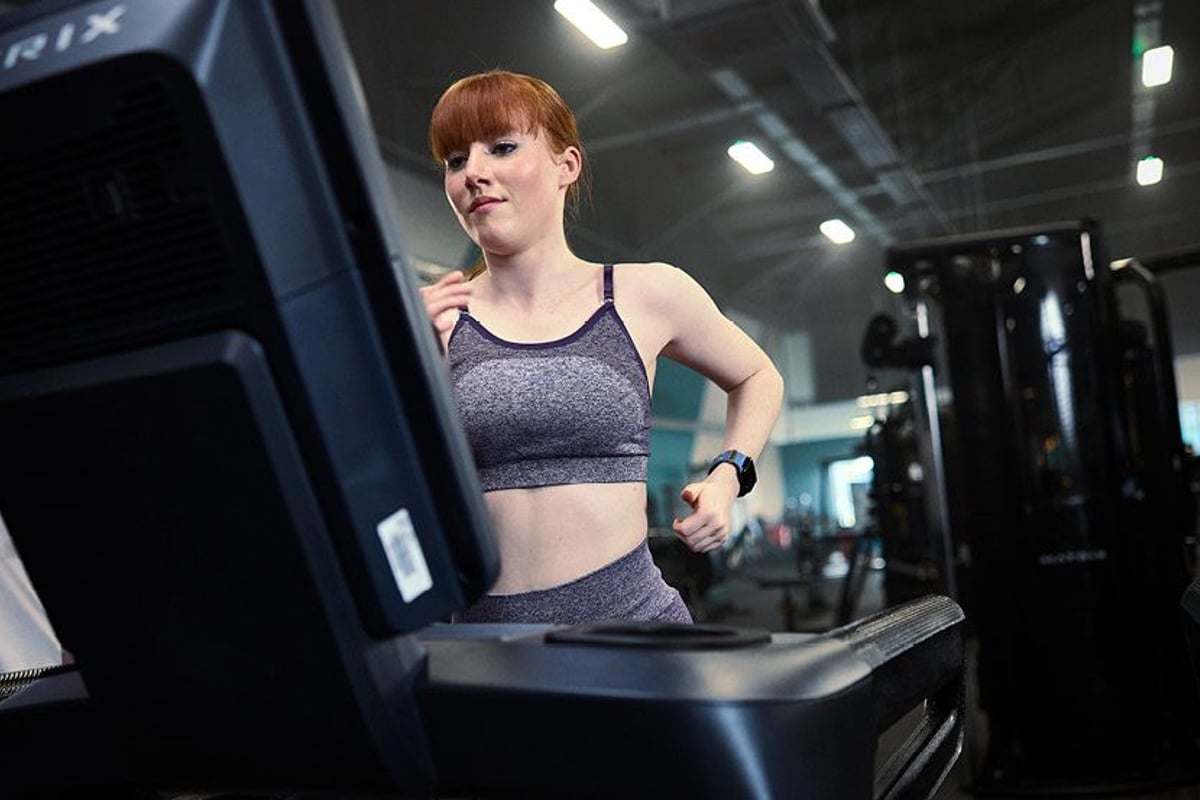 Lady running a treadmill
