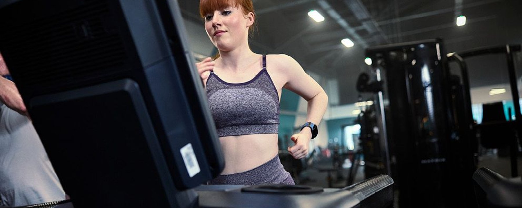 Lady running a treadmill