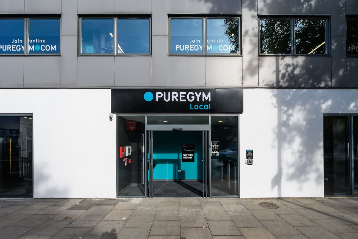 PureGym London Camberwell Southampton Way: Front entrance to a PureGym facility with illuminated signage.