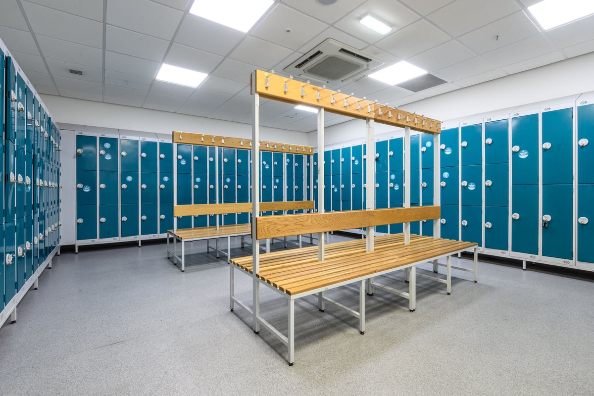 PureGym Glasgow Clydebank changing rooms with benches and lockers