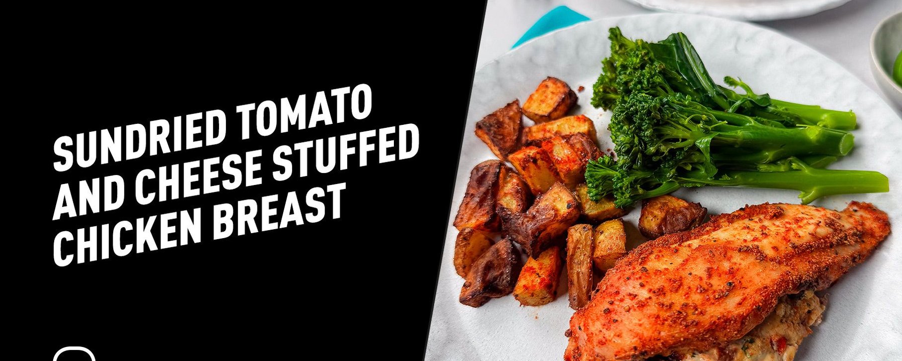Stuffed chicken breast with roasted potatoes and steamed broccolini on a white plate
