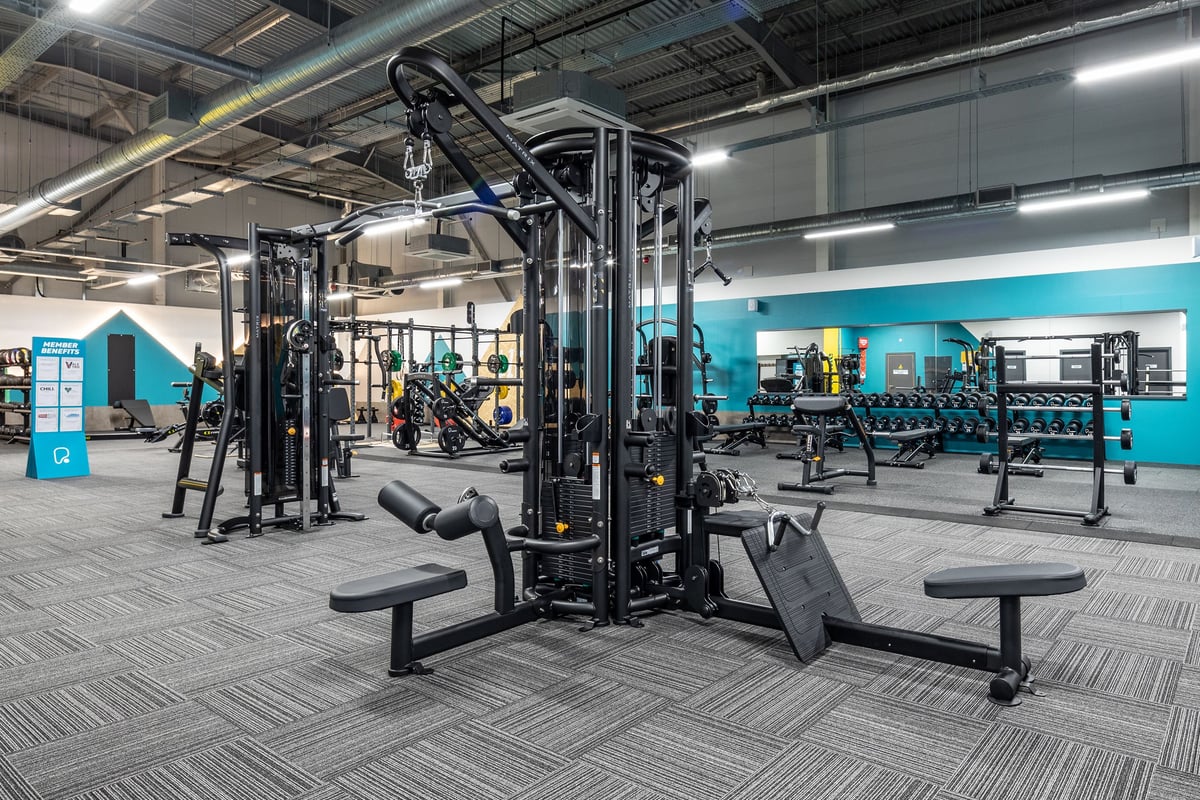 PureGym Wantage: Gym with squat racks, benches, weight machines, free weights, and rubberized flooring.