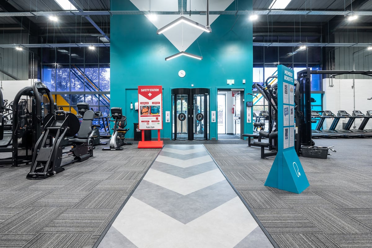 PureGym Dunfermline: Treadmills, ellipticals, weight racks, free weights, resistance machines, and rubberized flooring.