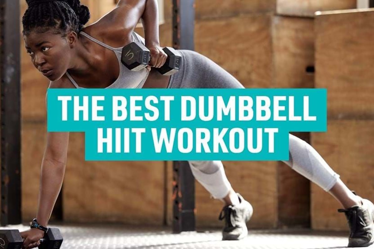 Woman in sportswear doing a dumbbell row exercise in a gym setting