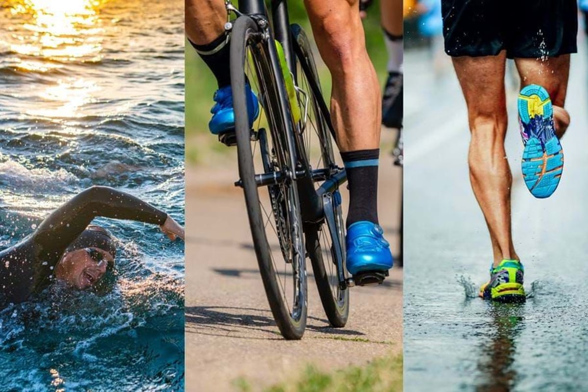 Swimmer in wetsuit, cyclist pedalling, and runner splashing on wet road.