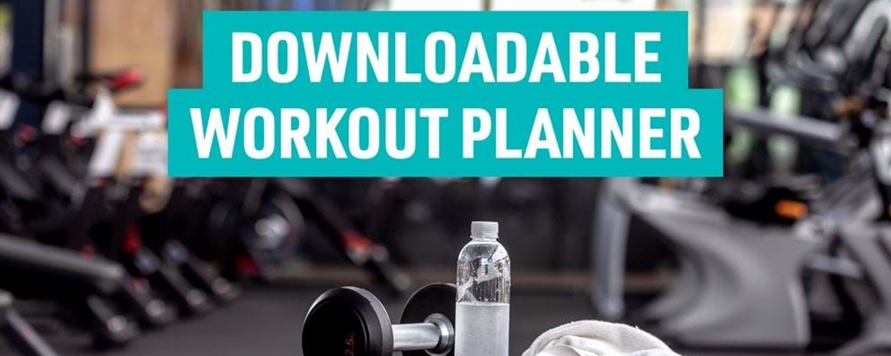 Dumbbell, water bottle, and towel on bench in gym with downloadable workout planner text