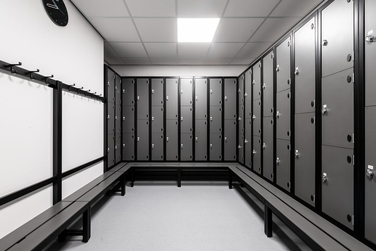 PureGym Inverness Inshes Retail Park: Rows of lockers with combination locks in a changing room.