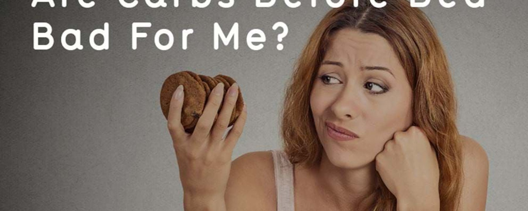 Woman looking uncertainly at cookies in her hand against grey background with text.