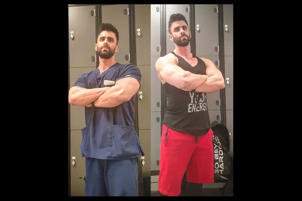 Two muscular men with crossed arms standing in front of lockers in gym changing room