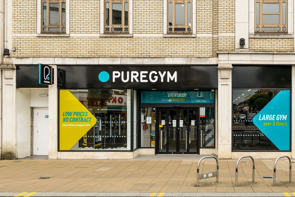 PureGym London Wimbledon: Gym frontage displaying low prices, large gym signage, inviting entrance.