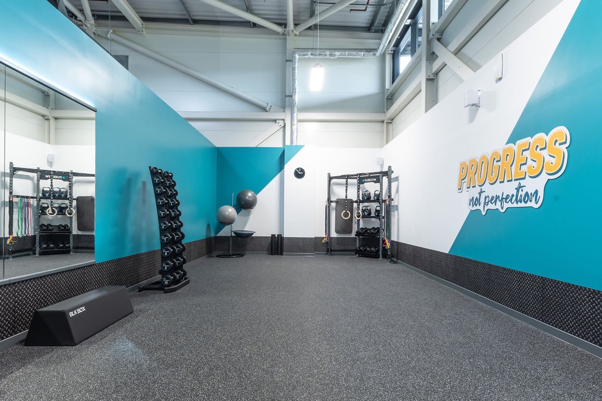 PureGym Nottingham Colwick: Weight racks, exercise balls and motivational wall signage.