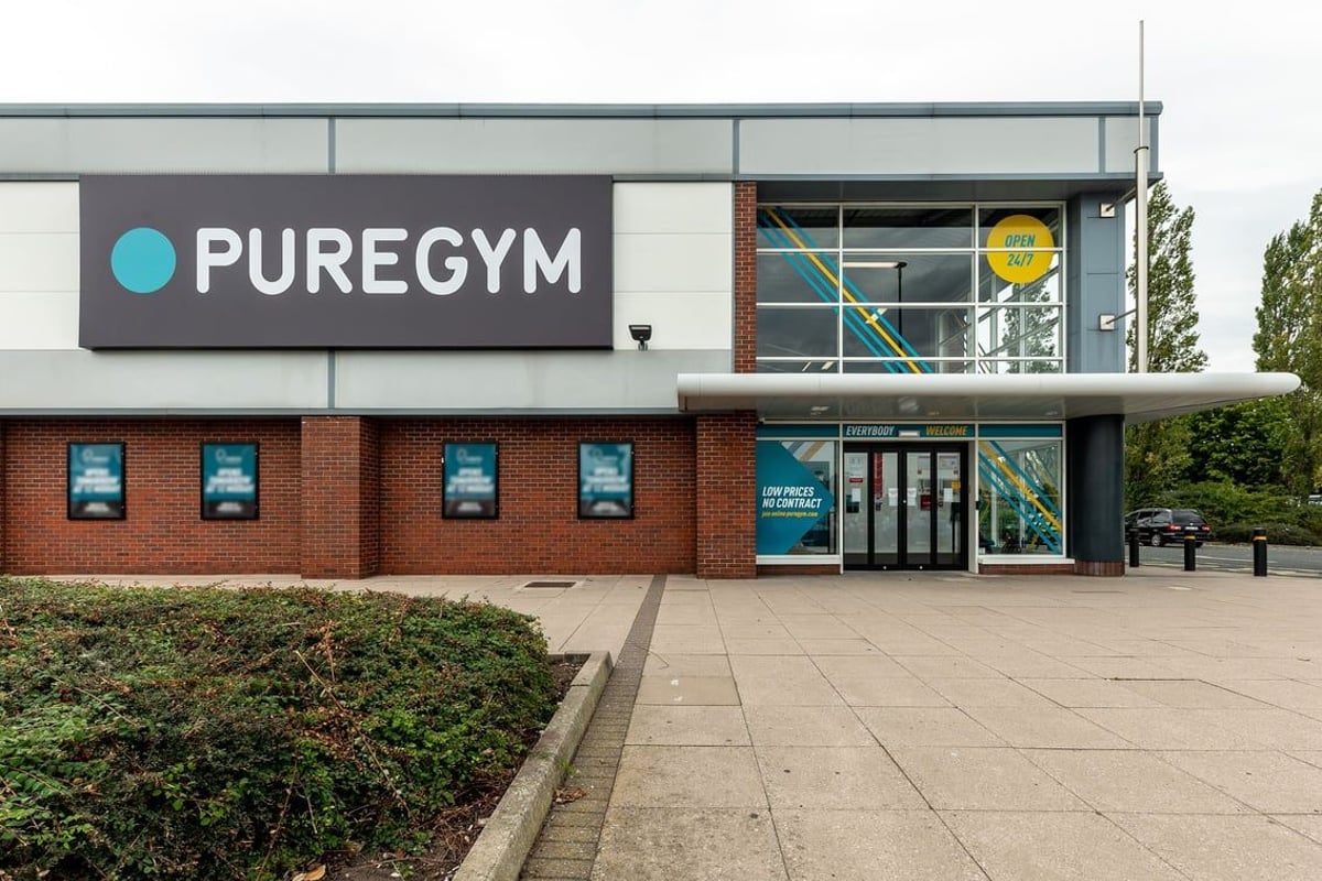 PureGym Tamworth: Exterior of gym building with PureGym branding, windows, and brick facade.