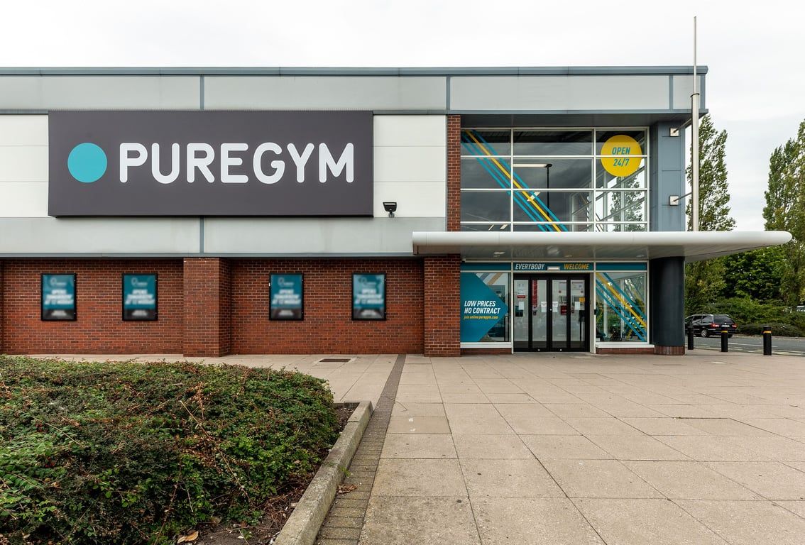 PureGym Tamworth: Exterior of gym building with PureGym branding, windows, and brick facade.