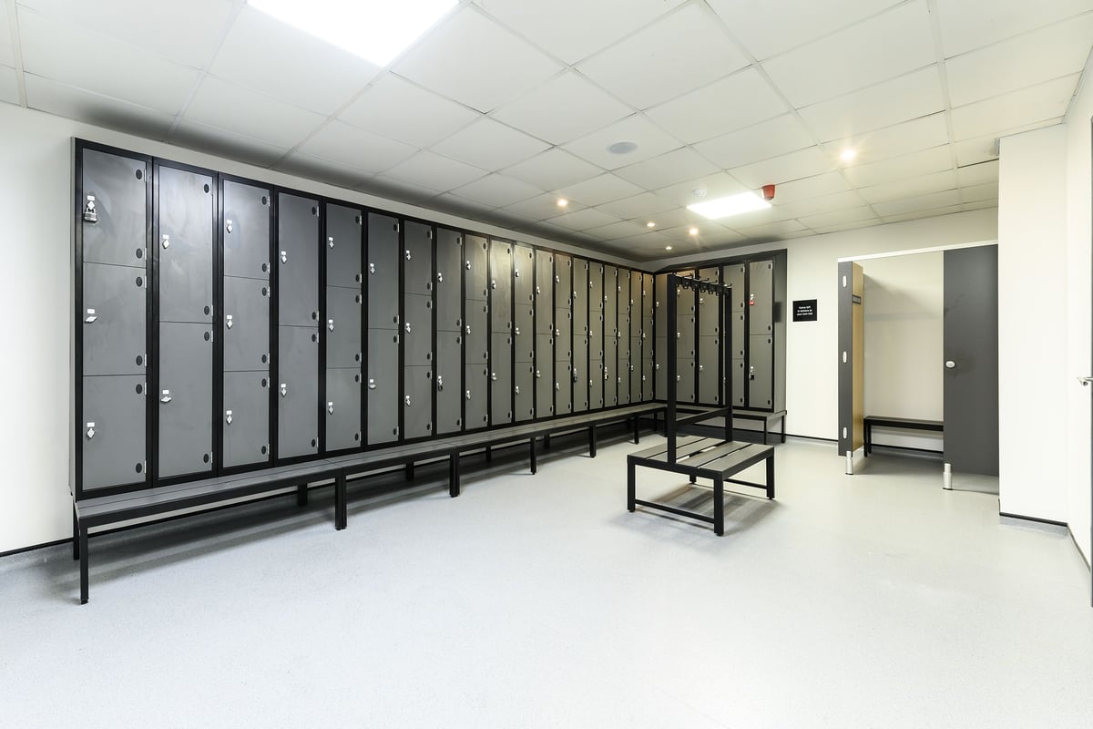 PureGym Waterlooville: Rows of lockers, benches, providing secure storage for personal belongings.