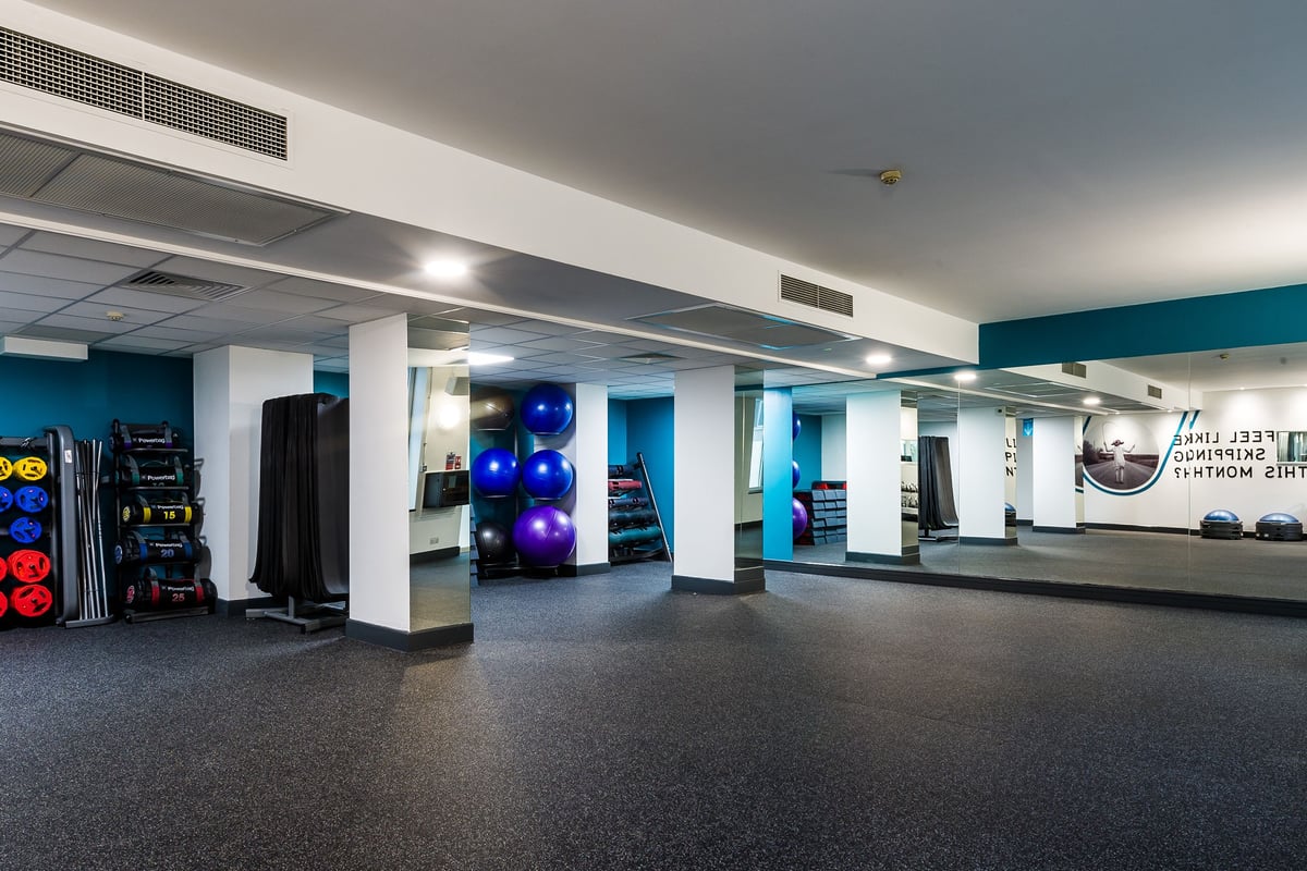 PureGym London Holborn: Studio functional training area with mirrors and free weights.