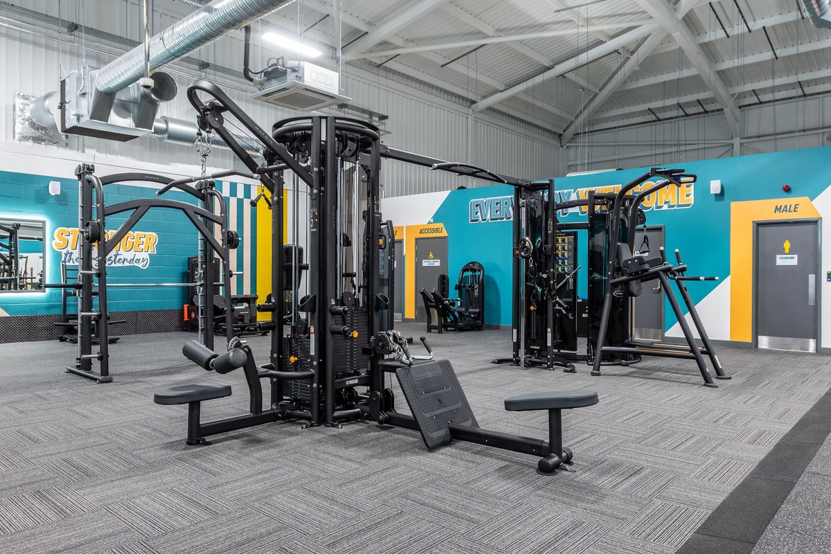 PureGym Winchester: Strength machines, free weights, benches and rubberized flooring in a branded gym studio.