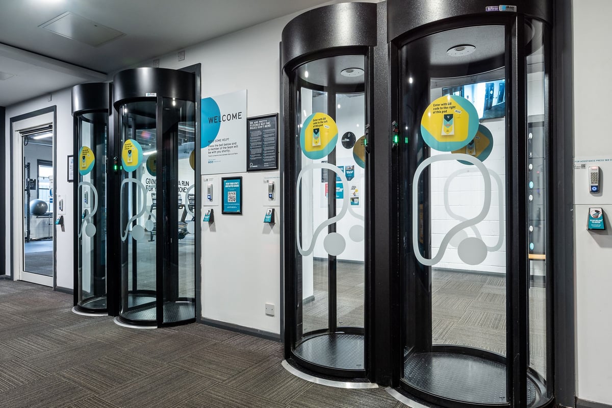 PureGym Bristol Union Gate: Revolving security doors and information panels typically seen at fitness club entrances.