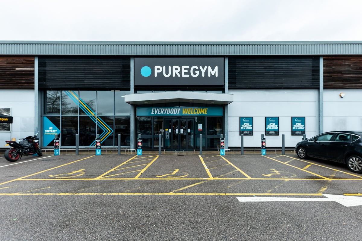 PureGym Maidenhead: The outside of a gym building with 'PUREGYM' signage and parking spaces.