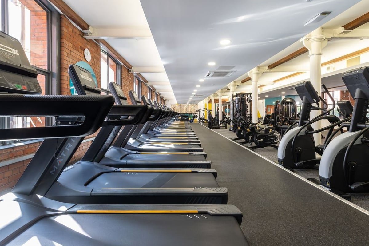 PureGym Belfast Adelaide Street cardio area with treadmills and bikes