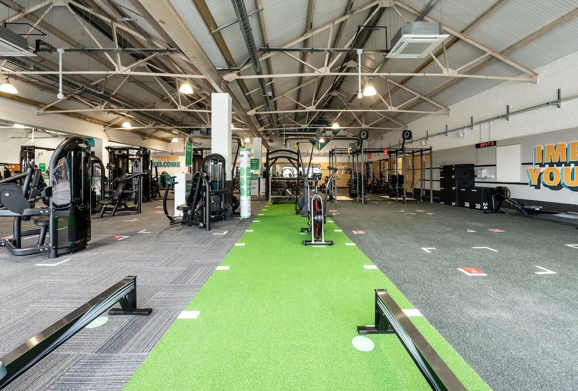 PureGym Puregym Crayford: Resistance machines, weight racks, free weights, turf area for functional training.