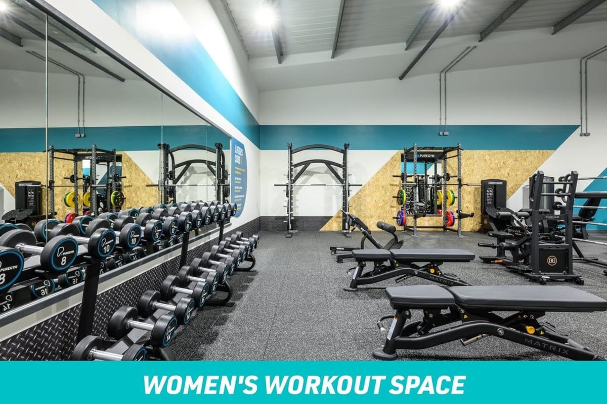 PureGym Colne Women's Workout Space: dumbbells and benches