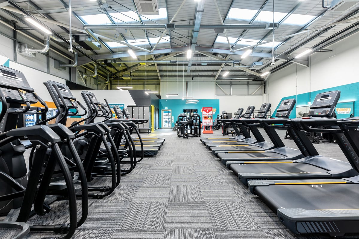 PureGym Broadstairs Westwood Gateway Retail Park: Rows of treadmills, ellipticals, and other cardio machines in a bright gym.