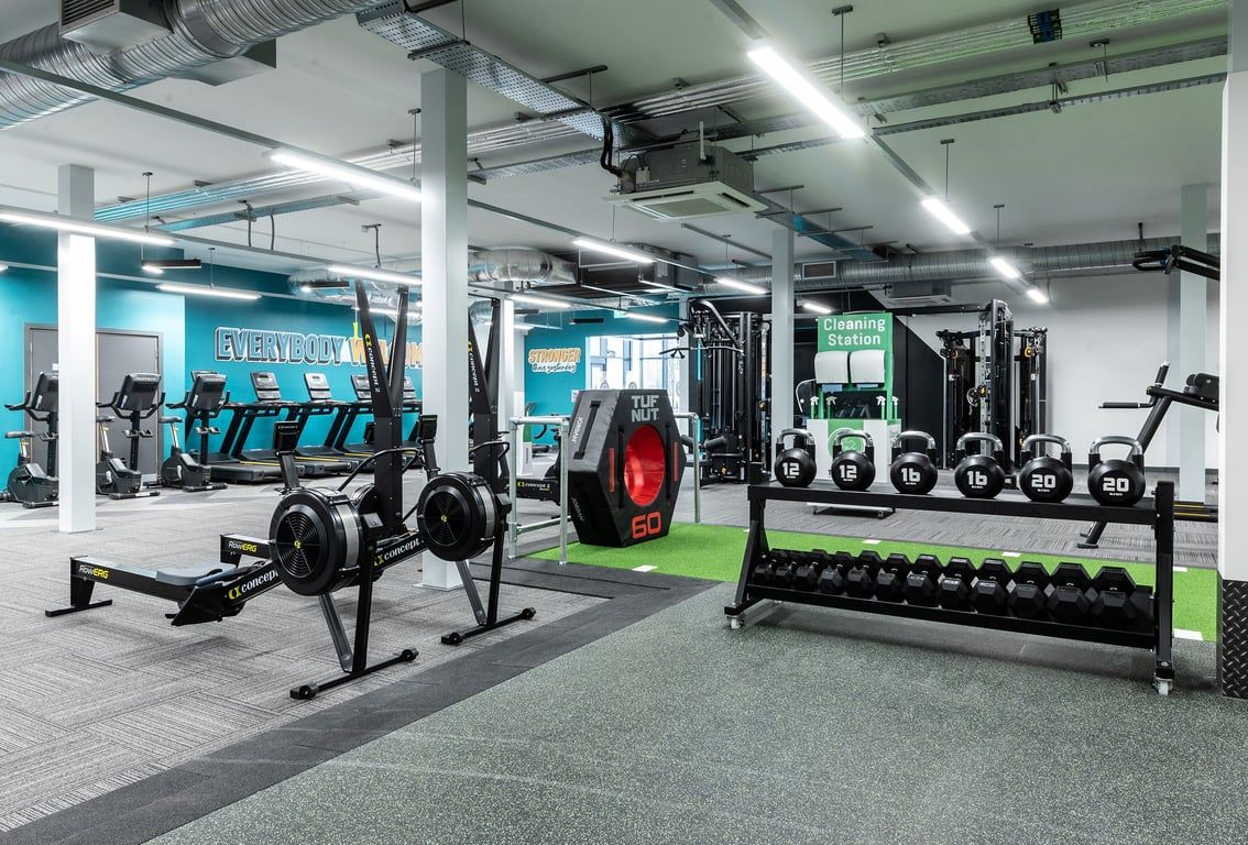 PureGym Milton Keynes Kingston Centre: Treadmills, weight racks, free weights, strength machines on rubberized gym flooring.