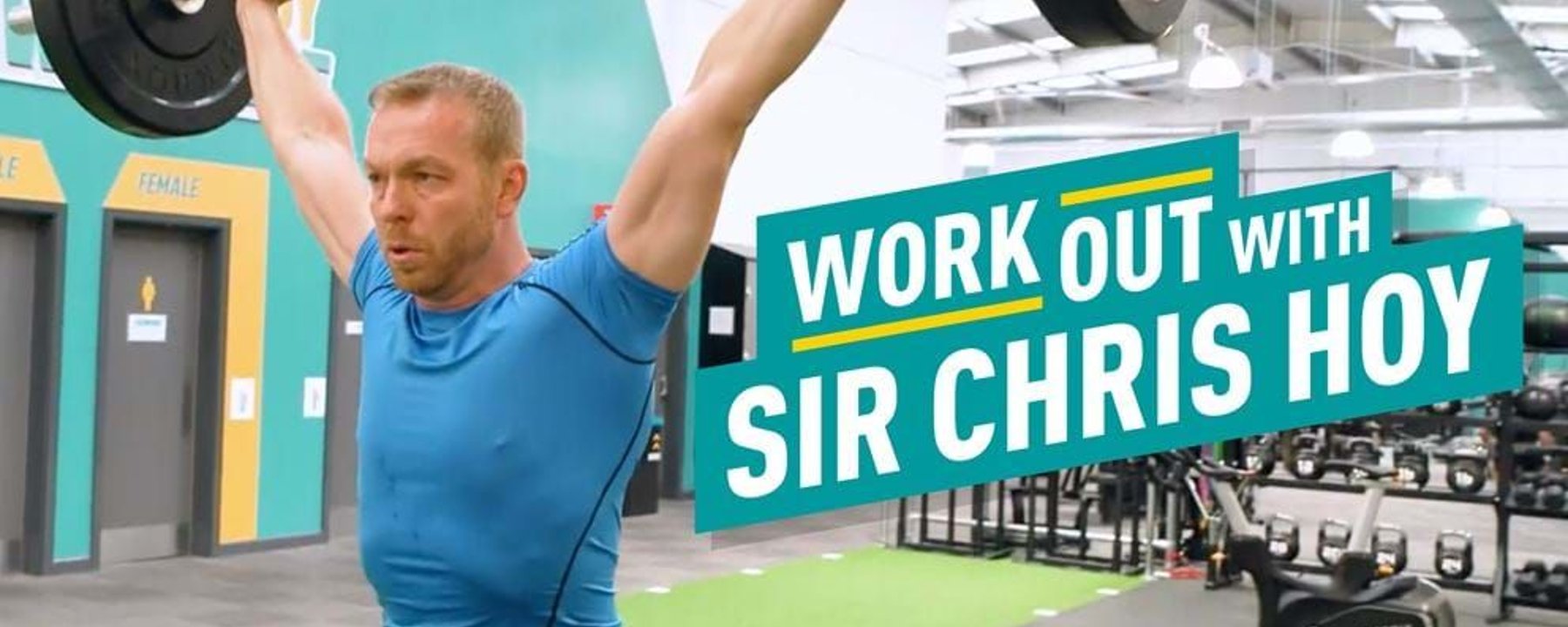 Man lifting barbell overhead in gym with workout text beside him
